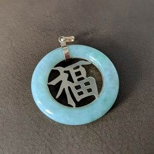 Jade and 14k gold pendant